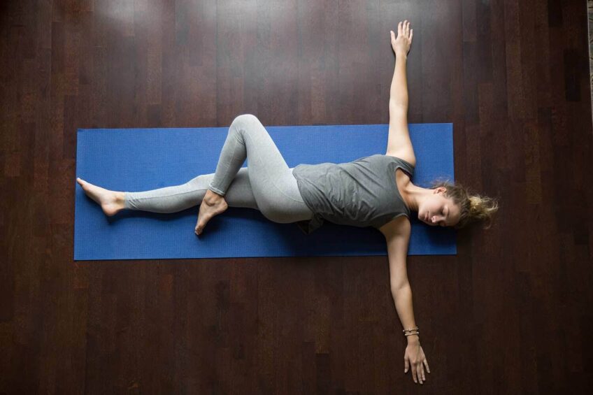 supine twist yoga